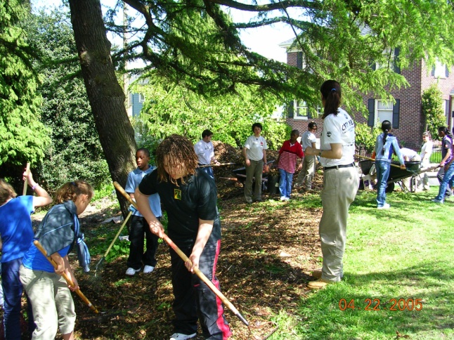 Students work with adults in service learning projects to build community.