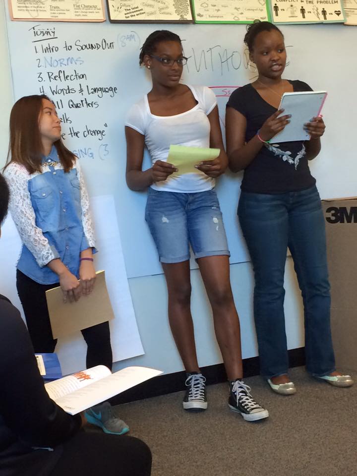 SoundOut students presenting their findings about the perfect school.